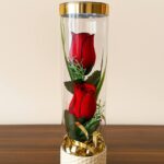 گل داخل شیشه استوانه